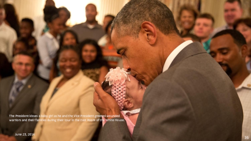 June 23, 2014 The President kisses a baby girl as