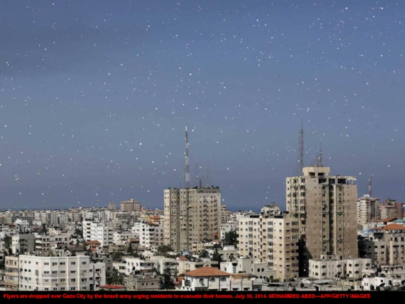 Flyers are dropped over Gaza City by the Israeli army urging