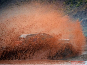 A competitor makes a splash during stage seven. photographer Franck Fife AFP